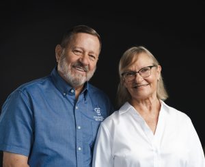 Male and female business persons representing the realtor team of Frank and Tracy Revalee